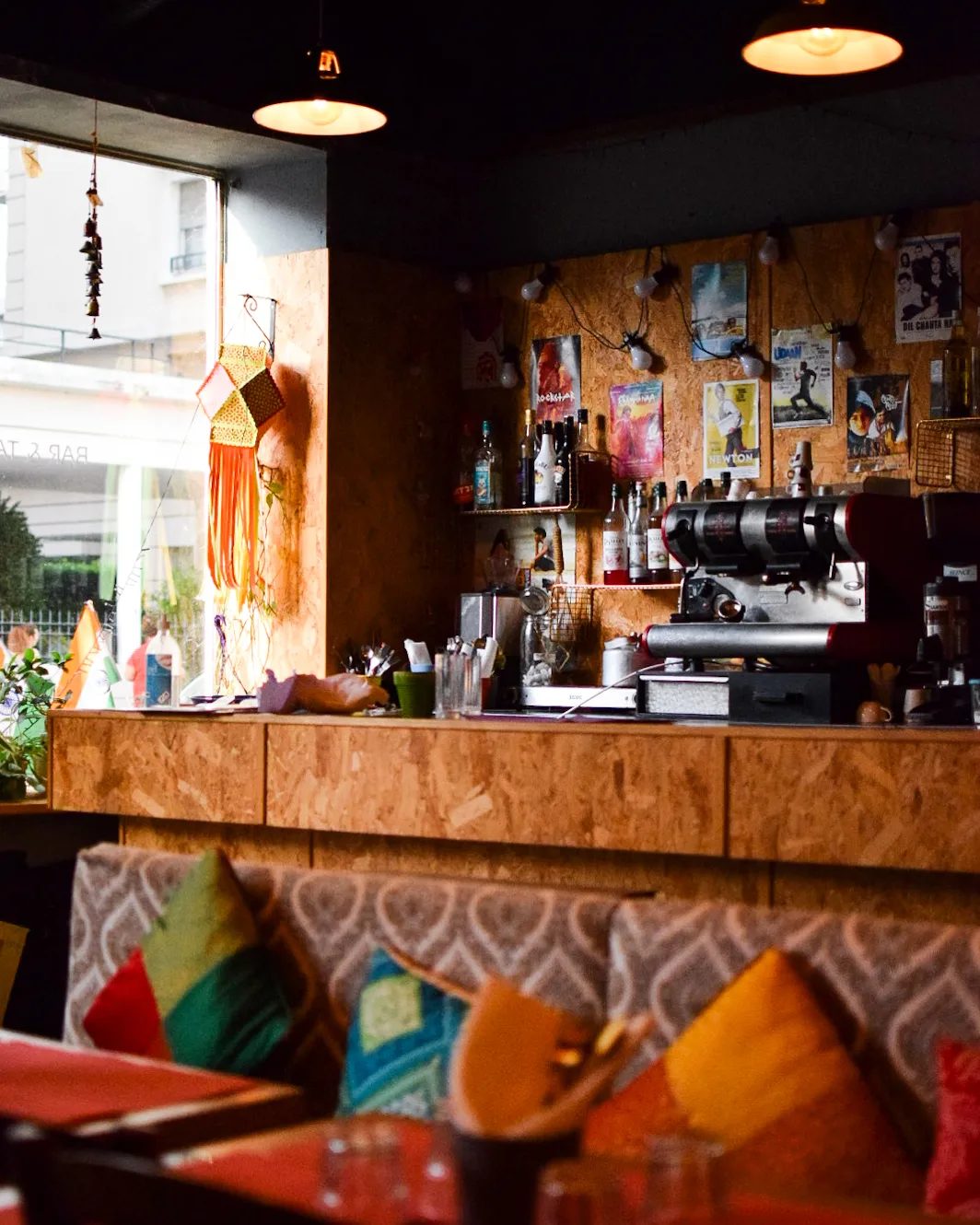 The bar and counter at Deb's Bistro, warm lamplight over a wooden top