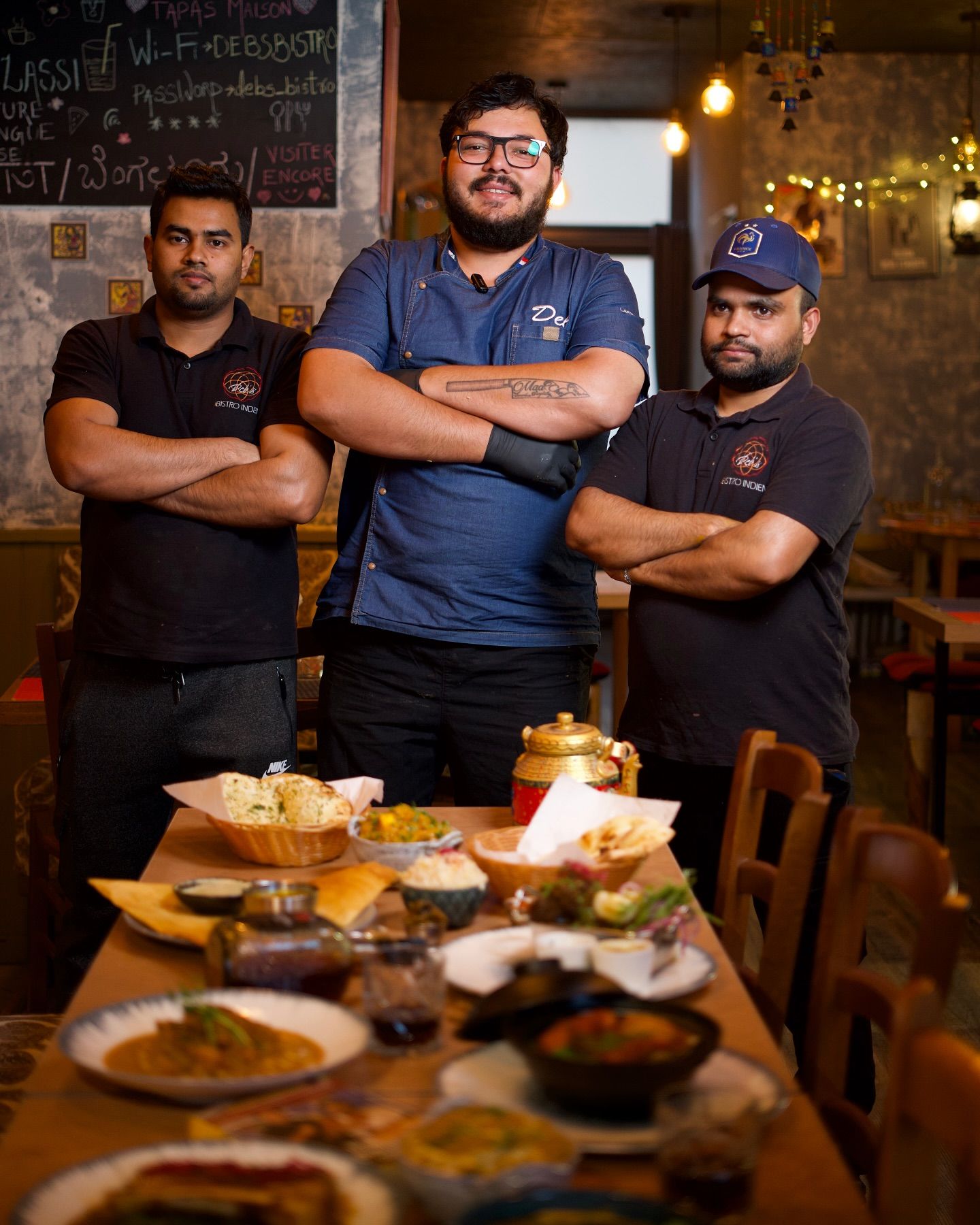 The Deb's Bistro team at a table in the dining room